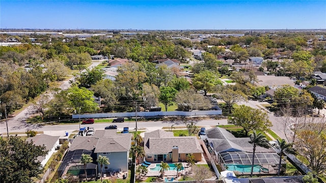 birds eye view of property with a residential view