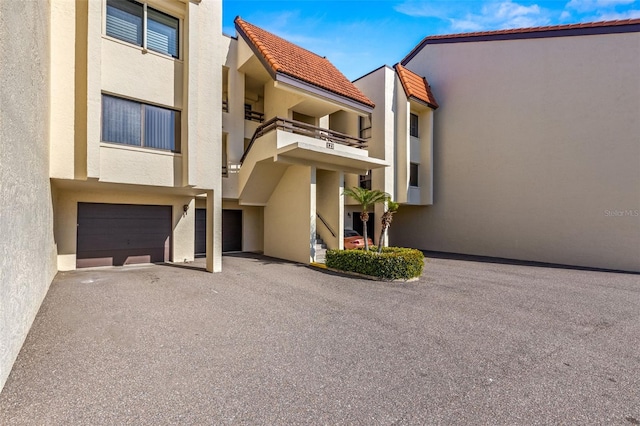 view of building exterior with a garage