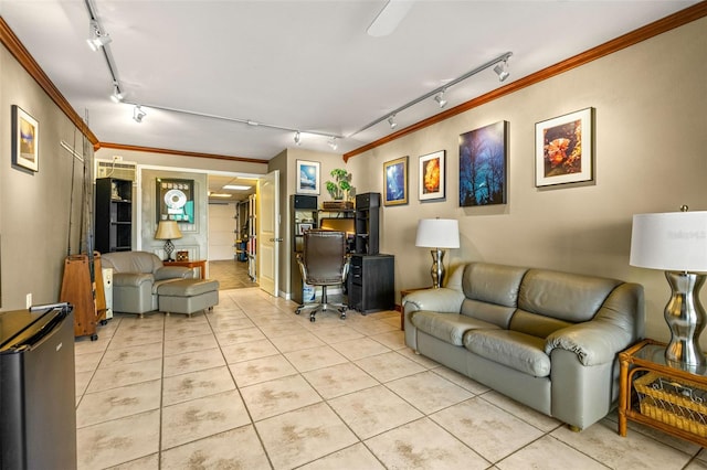 living room featuring light tile patterned flooring, track lighting, and crown molding