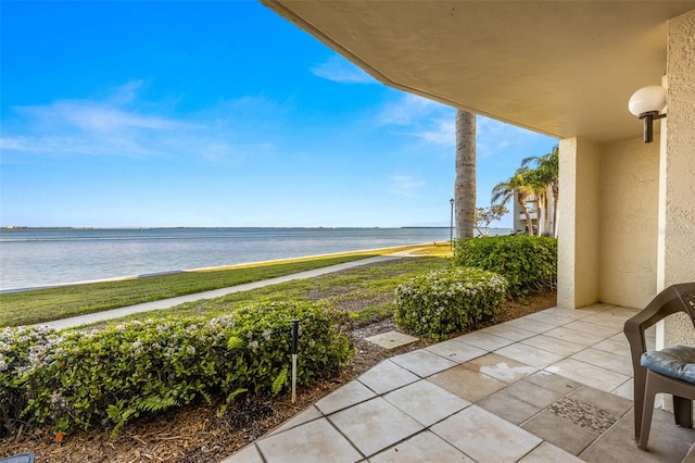 exterior space with a water view