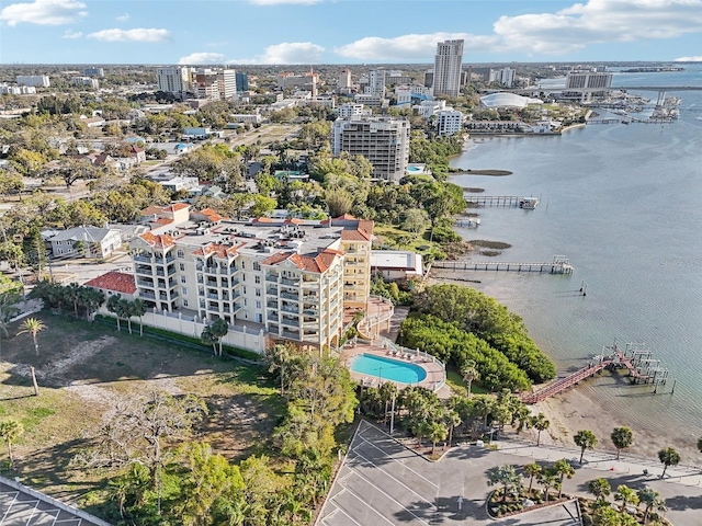 bird's eye view featuring a view of city and a water view