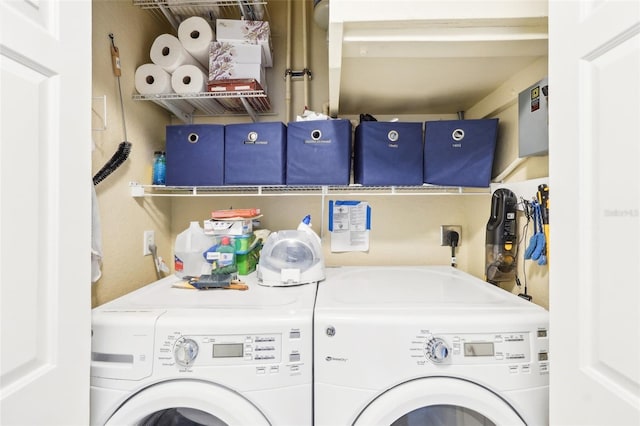 laundry room featuring washer and dryer and laundry area