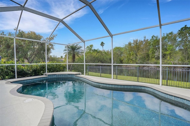 view of pool featuring a fenced in pool, a patio, a lanai, and fence