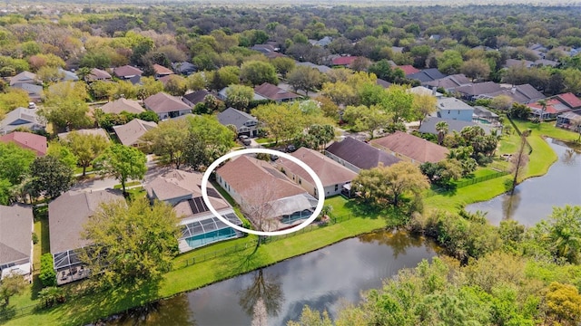 bird's eye view featuring a residential view and a water view