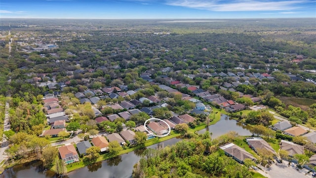 bird's eye view with a residential view and a water view