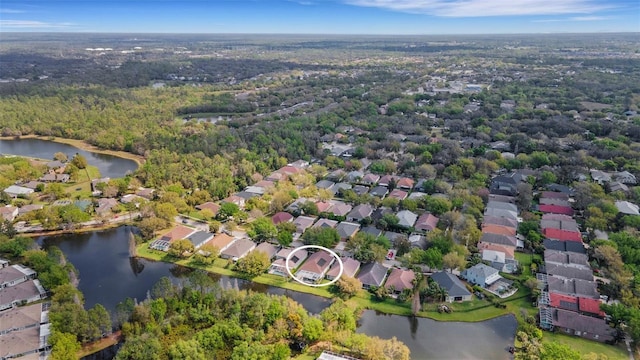 birds eye view of property with a residential view and a water view