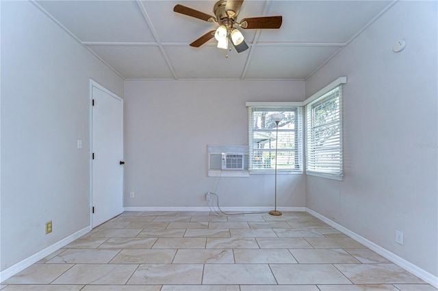 spare room featuring baseboards, coffered ceiling, and ceiling fan