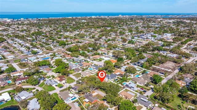 bird's eye view featuring a water view and a residential view