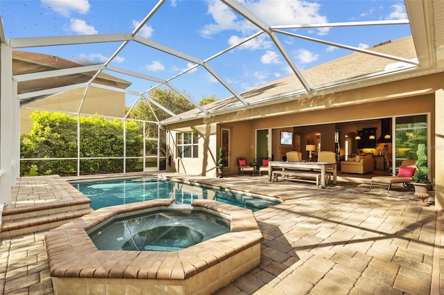 view of pool featuring a pool with connected hot tub and a patio