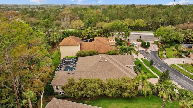 aerial view with a wooded view