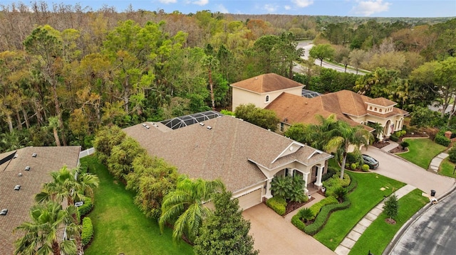 aerial view featuring a view of trees