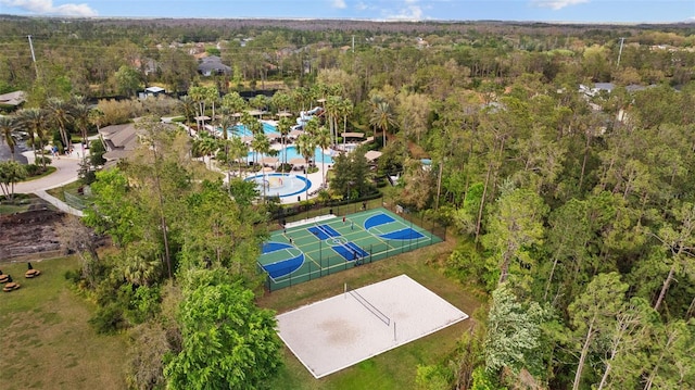 drone / aerial view with a view of trees