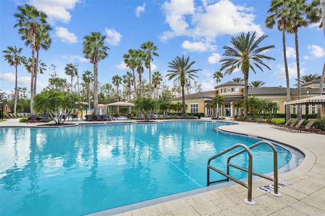 pool with a patio area