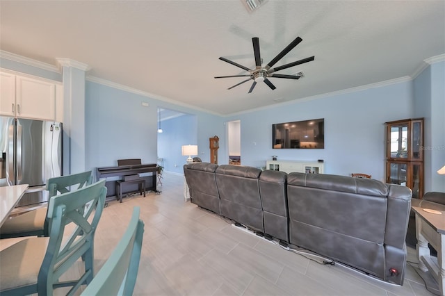 living area featuring ceiling fan and crown molding