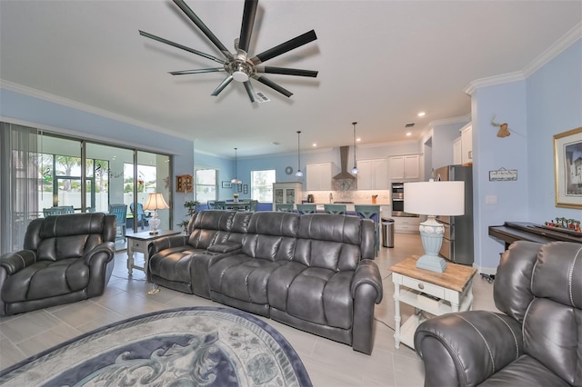 living room featuring light tile patterned floors, recessed lighting, ceiling fan, and ornamental molding