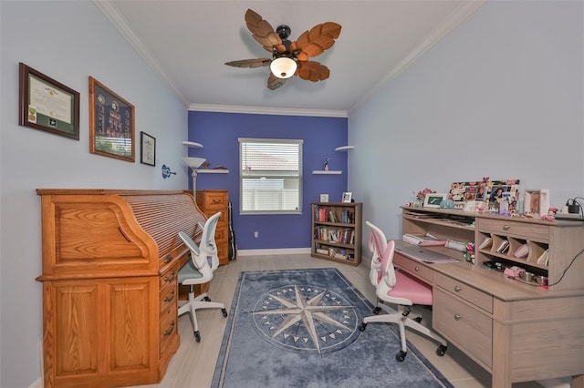 office area featuring crown molding, light wood-style floors, baseboards, and ceiling fan