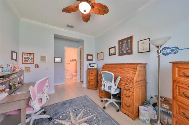 office area with visible vents, baseboards, ornamental molding, and a ceiling fan