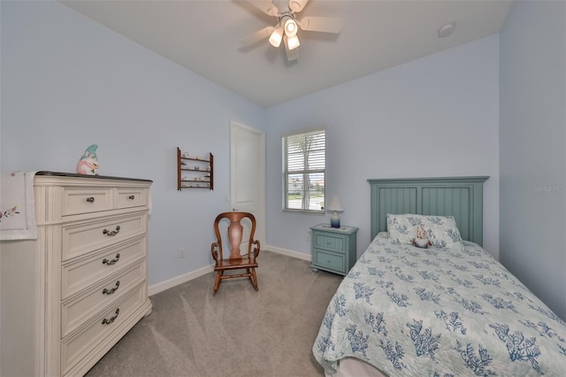 bedroom with carpet flooring, a ceiling fan, and baseboards