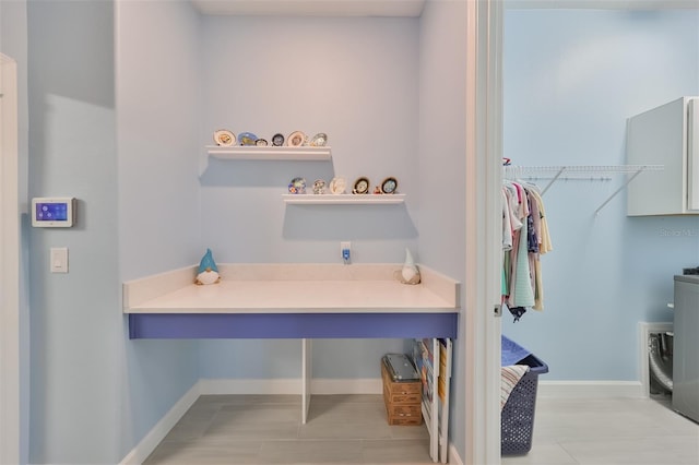 bathroom featuring baseboards