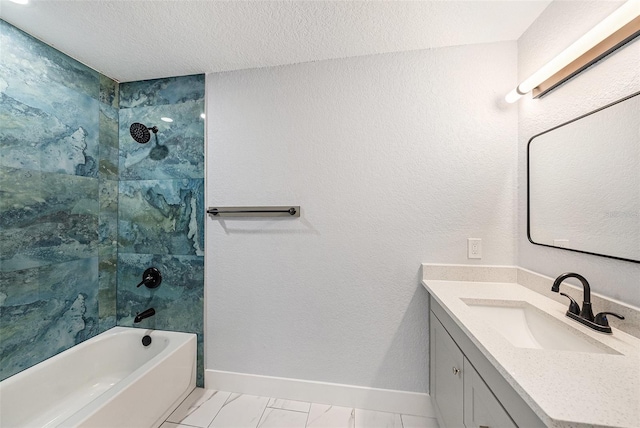 full bath featuring baseboards, a textured ceiling, shower / washtub combination, and vanity