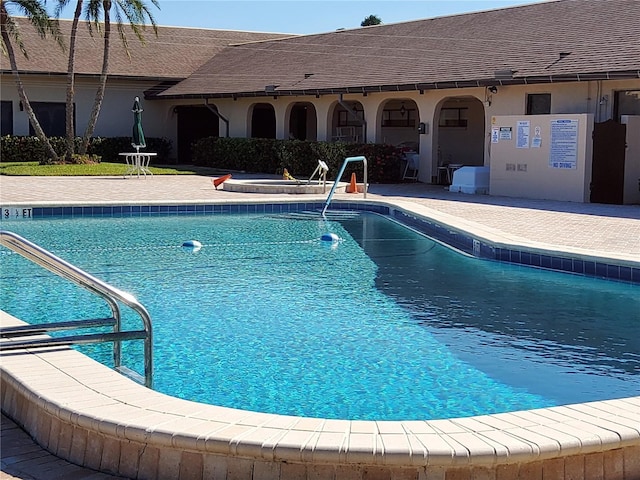 community pool featuring a patio