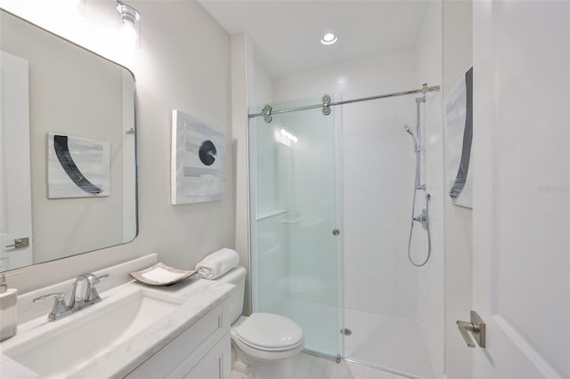 full bathroom featuring a shower stall, toilet, vanity, and recessed lighting