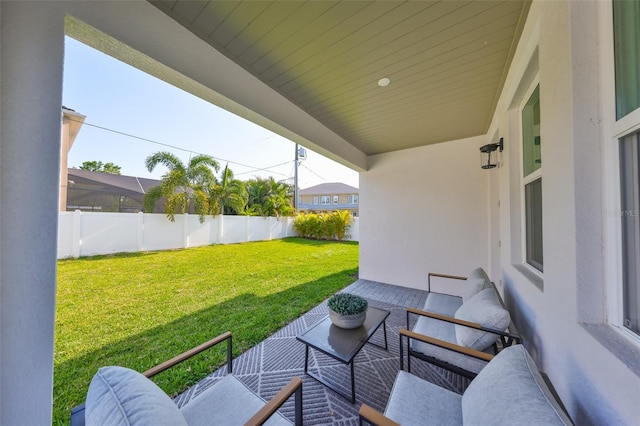 view of patio with a fenced backyard and an outdoor living space