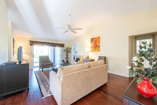 living room with vaulted ceiling, baseboards, ceiling fan, and dark wood-style flooring