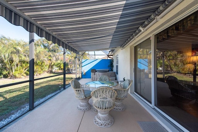 view of patio featuring outdoor dining area