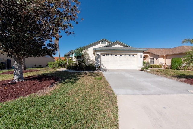 ranch-style house with a front lawn, an attached garage, driveway, and stucco siding