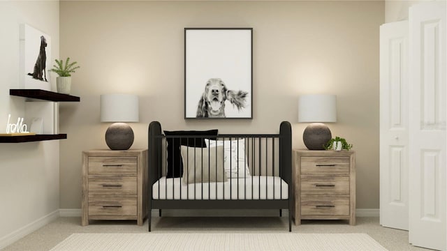 bedroom featuring baseboards and carpet