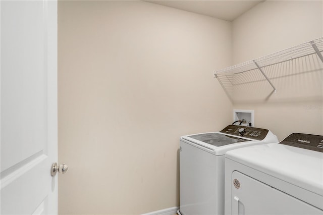 laundry room with laundry area and washer and dryer