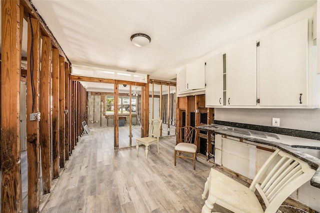 miscellaneous room featuring visible vents and light wood-style flooring