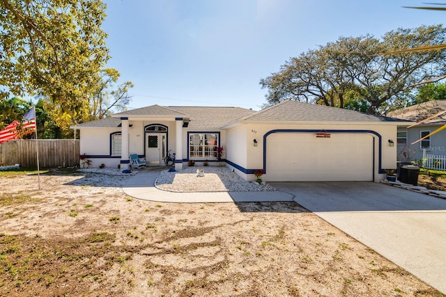 single story home with fence, roof with shingles, an attached garage, stucco siding, and concrete driveway