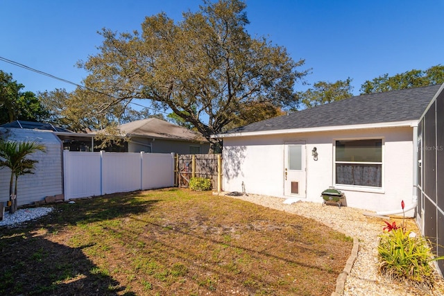 view of yard featuring fence