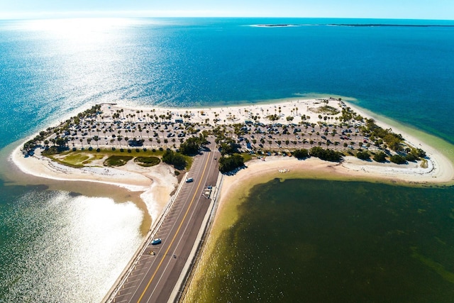 bird's eye view featuring a beach view and a water view