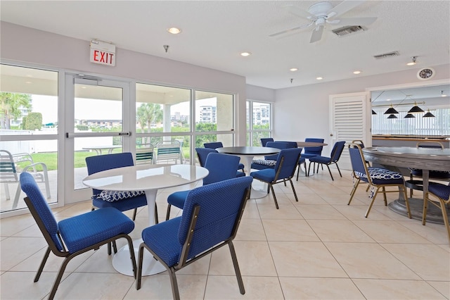 dining area featuring light tile patterned floors, visible vents, recessed lighting, and a ceiling fan