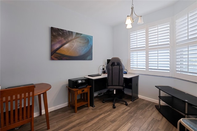home office featuring wood finished floors and baseboards