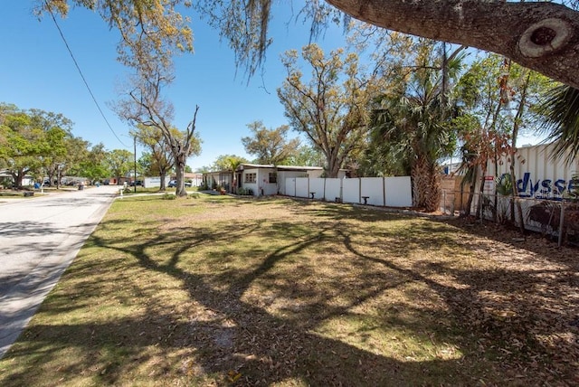 view of yard featuring fence