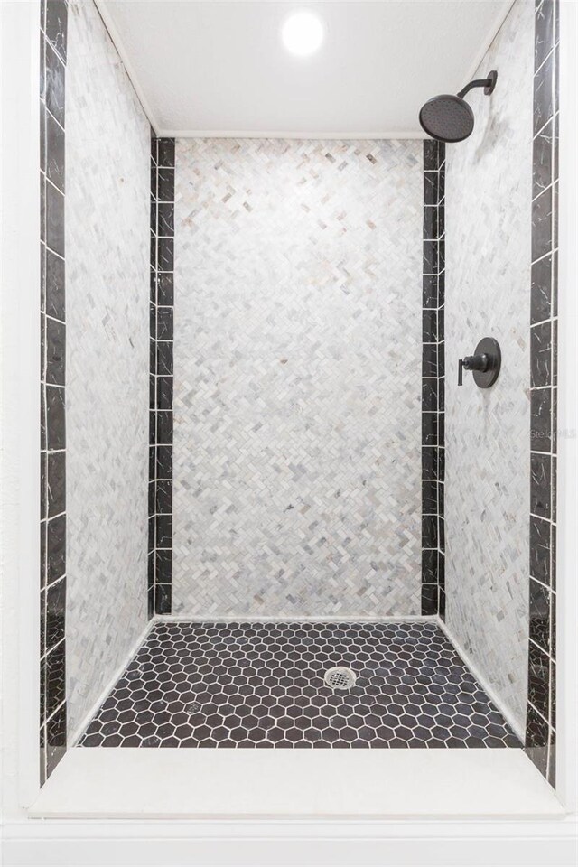 bathroom with a shower stall