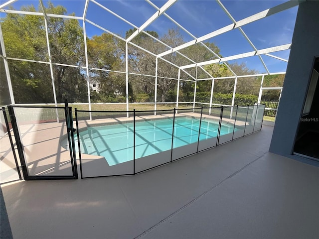 pool with a patio and a lanai