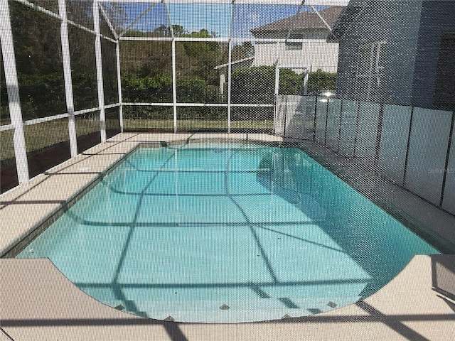 view of pool with a lanai and a fenced in pool