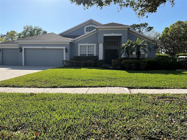 view of front of house featuring stucco siding, driveway, a front yard, and a garage