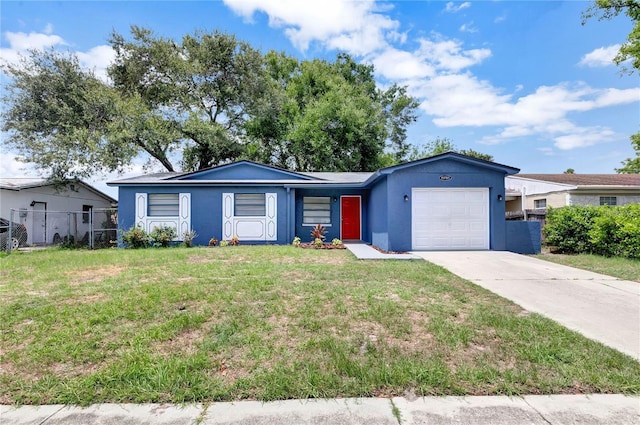 single story home featuring fence, an attached garage, stucco siding, concrete driveway, and a front lawn