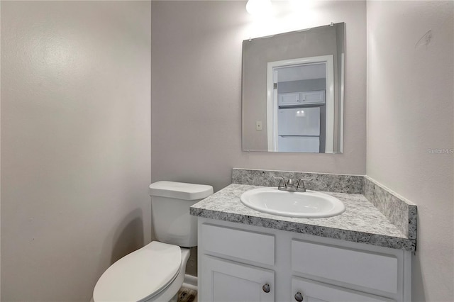 half bath with toilet and vanity