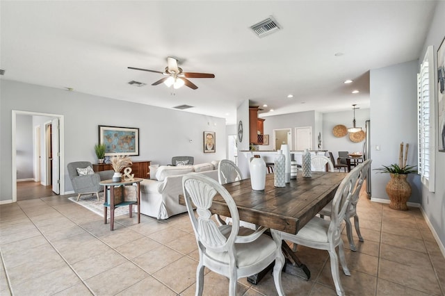 dining room with a ceiling fan, light tile patterned flooring, recessed lighting, and visible vents