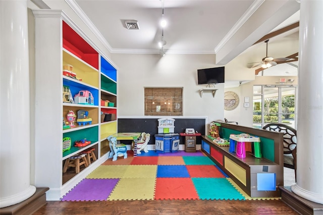 game room featuring visible vents, ceiling fan, track lighting, and ornamental molding