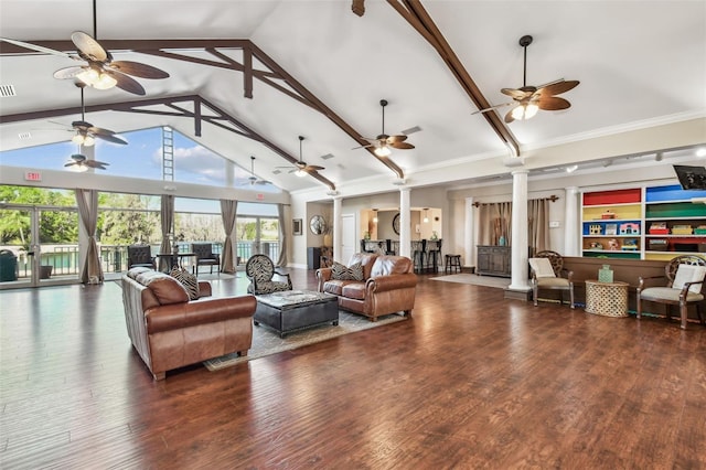 living area featuring a ceiling fan, wood finished floors, ornate columns, and high vaulted ceiling