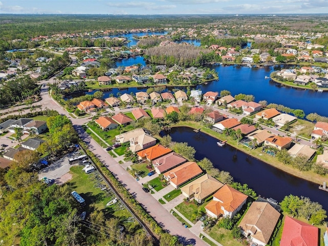 aerial view with a residential view and a water view