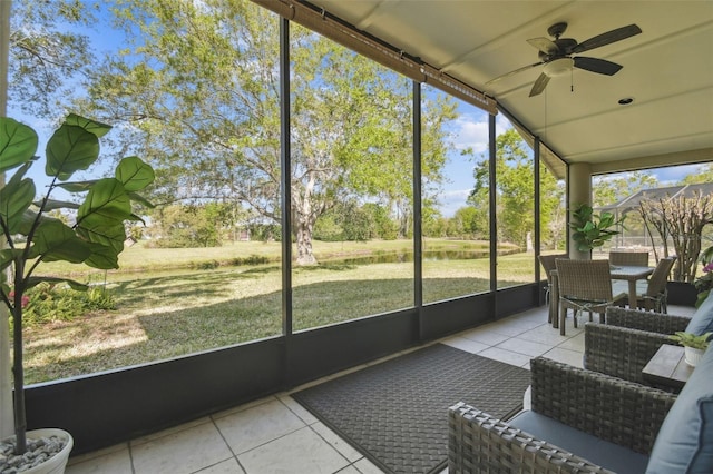 sunroom with a ceiling fan